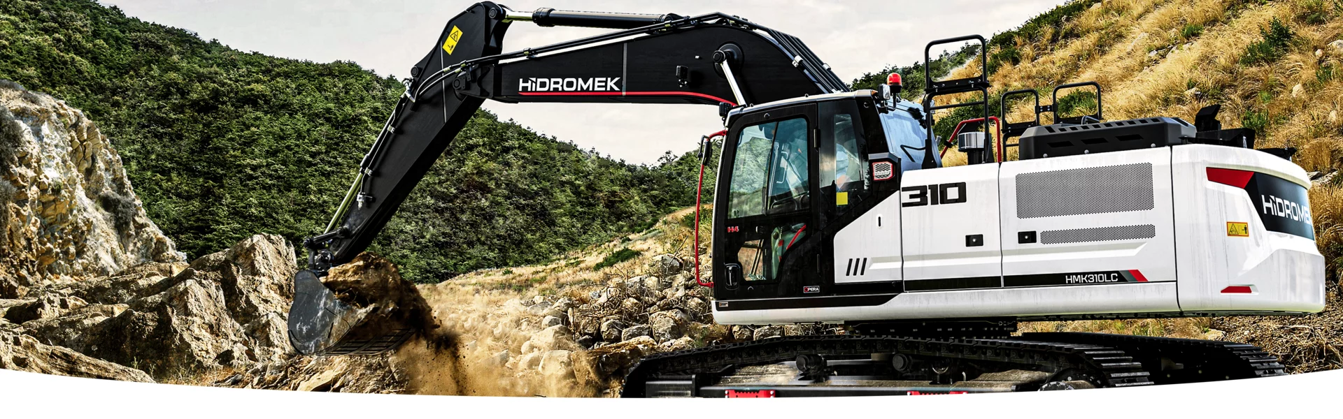 Pelle Hidromek en action